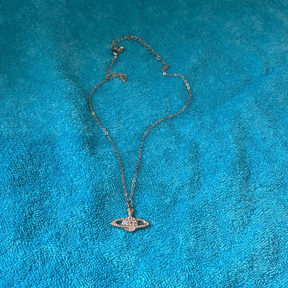 Skull planet necklace